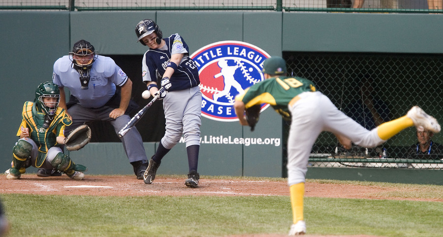 After falling behind again to Northwest in game 4, Pearlands Jaron Roblyer hits a home run to start a rally during the fourth inning.  
