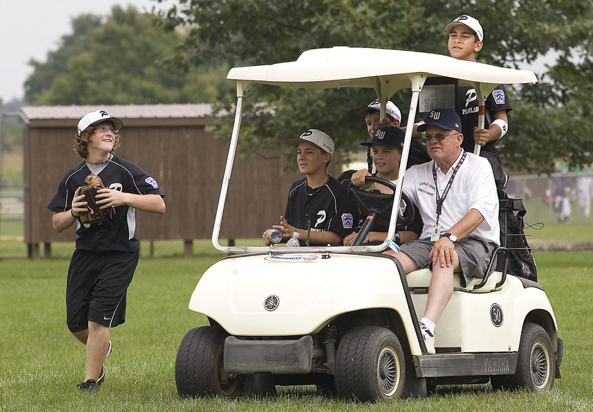 Dick Reitz, gives members of the Pearland team a ride while switching fields during practice on Saturday afternoon.  Uncle Dick, as the team would call him, has been working the Little League World Series for over 25 years.